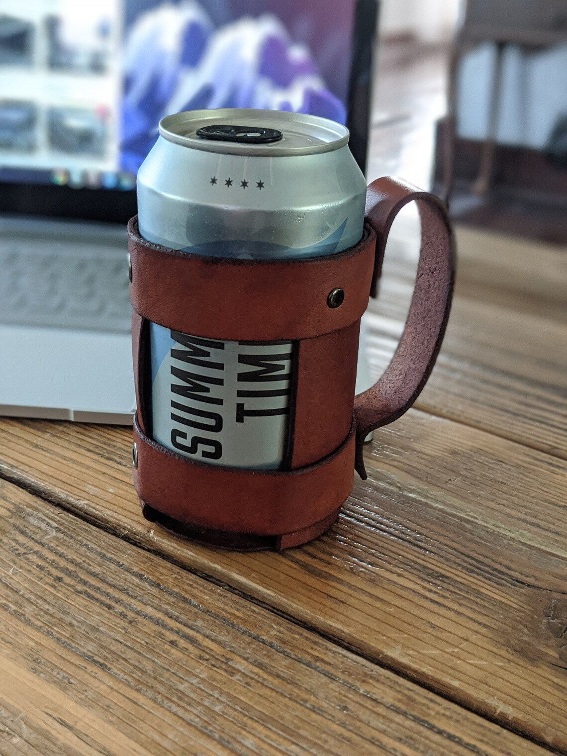 Brown leather beverage can holster with handle